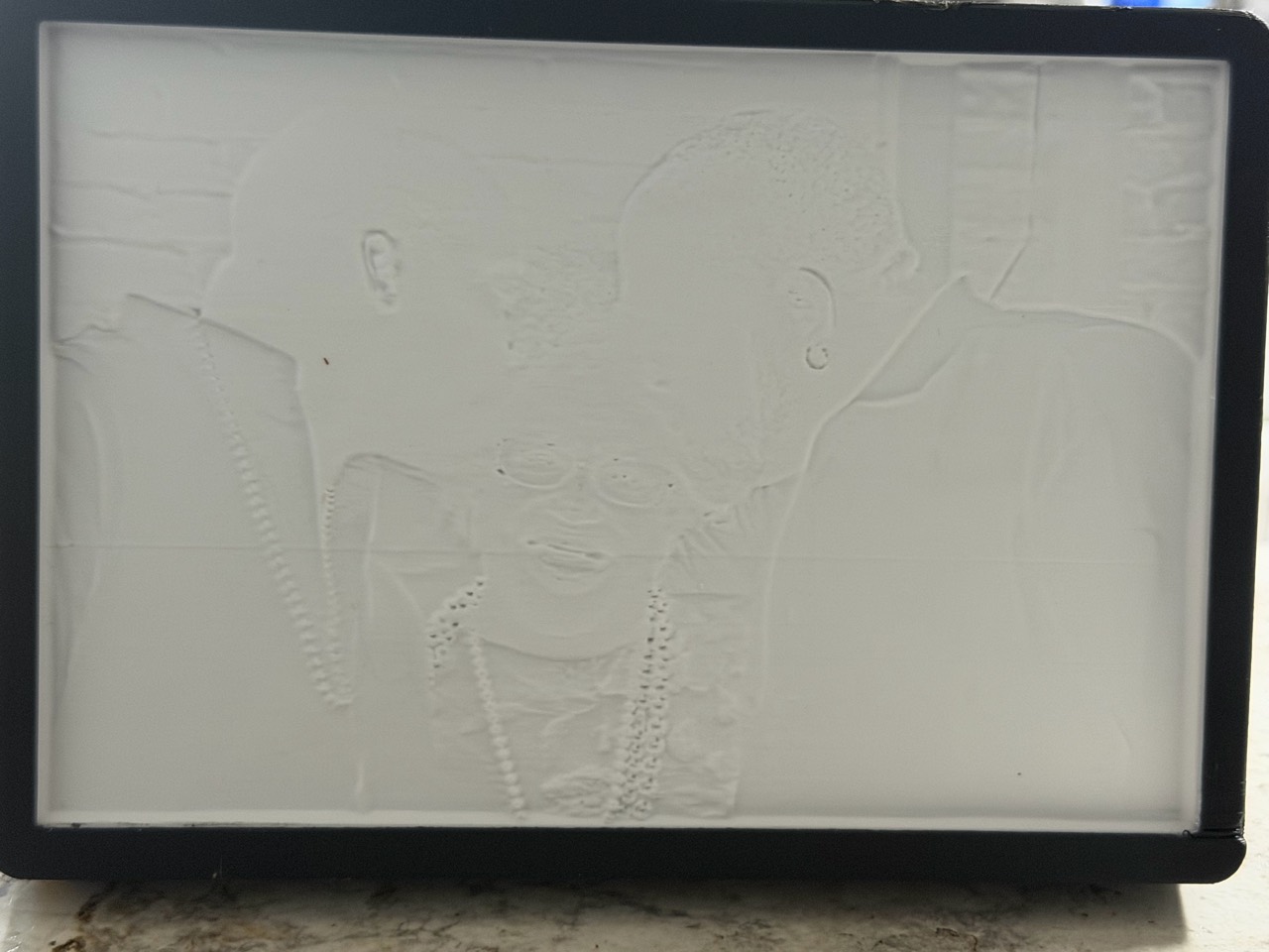 Custom Memory Light switched off, showing the raised details of the 3D-printed photo panel