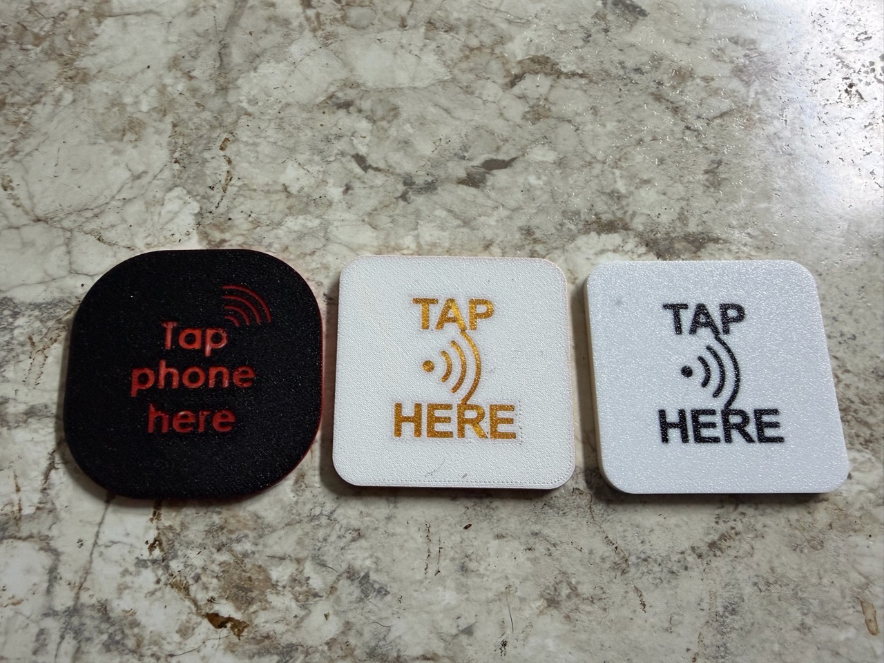 Three customizable Mini Tap NFC pieces